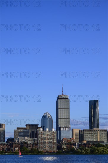 City skyline with boat on Charles River in Boston, Massachusetts, USA