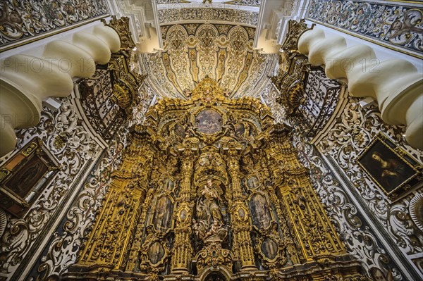 Ornate alter in Church of Saint Louis of France in Seville, Andalusia, Spain