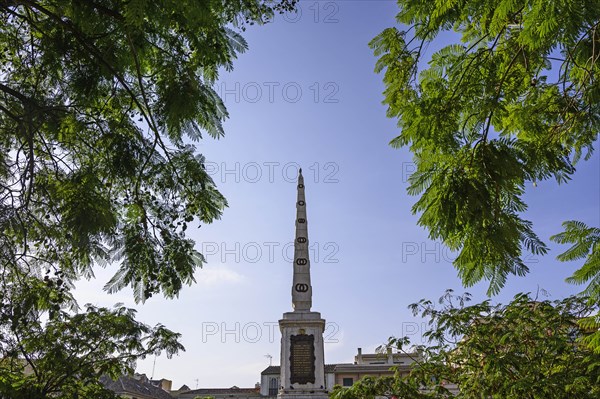 Torrijos Monument against clear sky at Plaza de la Merced in Malaga, Spain