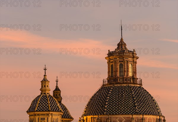 Domes of Church of Saint Louis of France at sunset in Seville, Andalusia, Spain