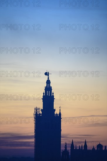 Silhouette of Giralda at sunrise in Seville, Andalusia, Spain