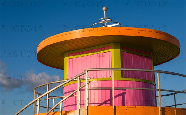 Pink and orange beach hut against sky in Miami, Florida, USA