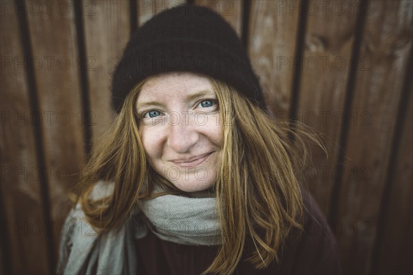 Portrait of smiling young woman wearing woolly hat