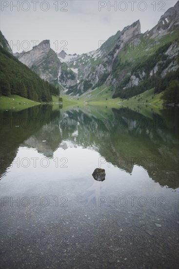 Seealpsee lake in Appenzell Alps, Switzerland