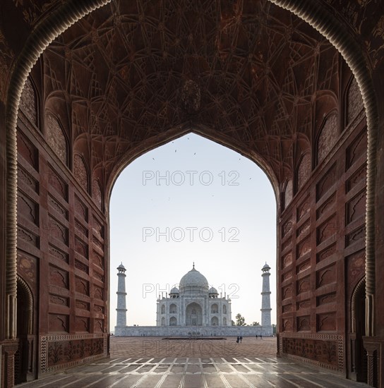 Taj Mahal behind arch in Agra, Uttar Pradesh, India