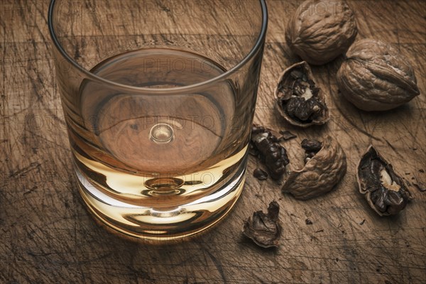 Drink in glass and walnuts