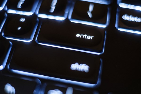 Illuminated 'enter' key on keyboard