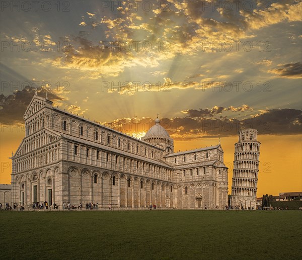 Leaning Tower of Pisa and Piazza dei Miracoli at sunset in Tuscany, Italy