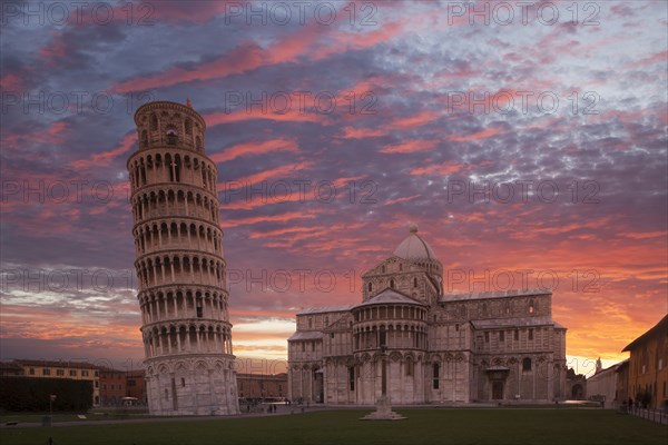 Leaning Tower of Pisa and Piazza dei Miracoli at sunset in Tuscany, Italy