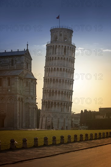 Leaning Tower of Pisa and Piazza dei Miracoli at sunset in Tuscany, Italy