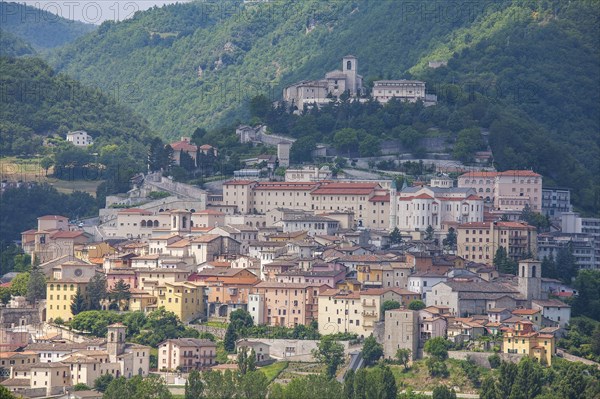 Cityscape by mountain in Cascia, Italy