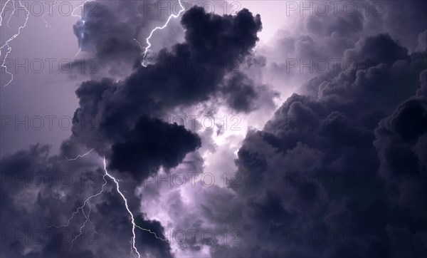 Lightning and storm clouds in sky