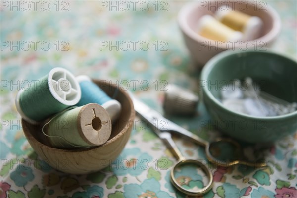 Spools of thread in bowl