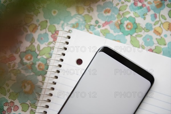 Smart phone on note pad