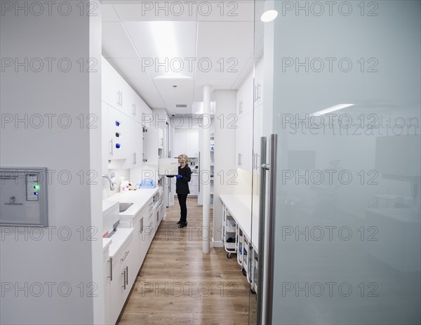 Dentist's assistant cleaning equipment