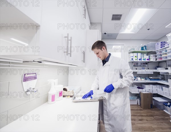 Dentist working in sterilization room