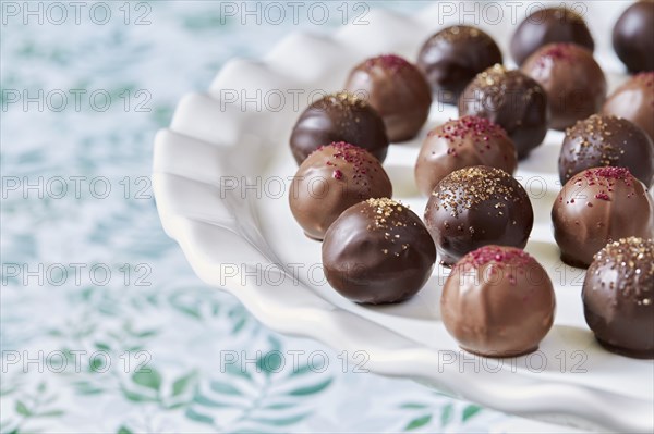Chocolate truffles on plate