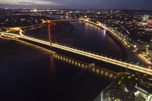 Aerial view of Rheinkniebrucke at night in Dusseldorf, Germany