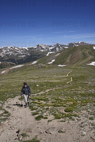 Woman hiking in mountains of Loveland Pass, Colorado