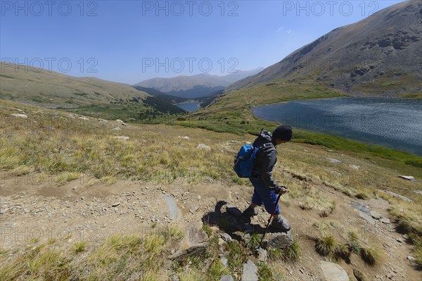 Woman hiking on Silver Dollar Trail in Colorado