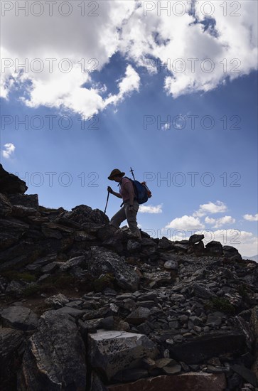 Woman hiking on Mount Flora in Colorado