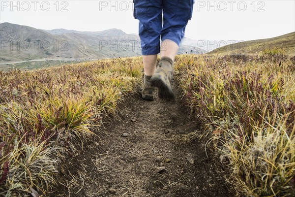 Legs of woman hiking Loveland Pass in Colorado