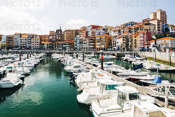 Moored boats and buildings on the waterfront of Bermeo, Spain