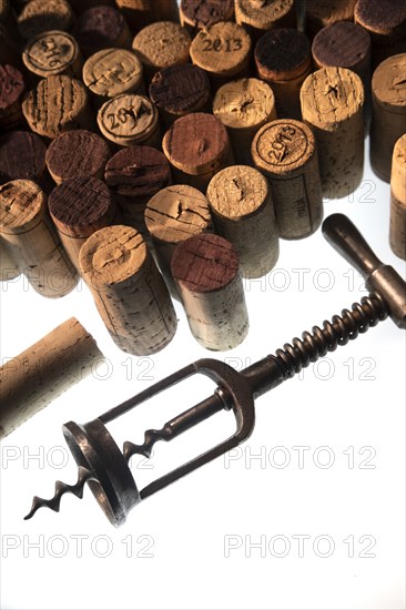 Corkscrew and collection of corks