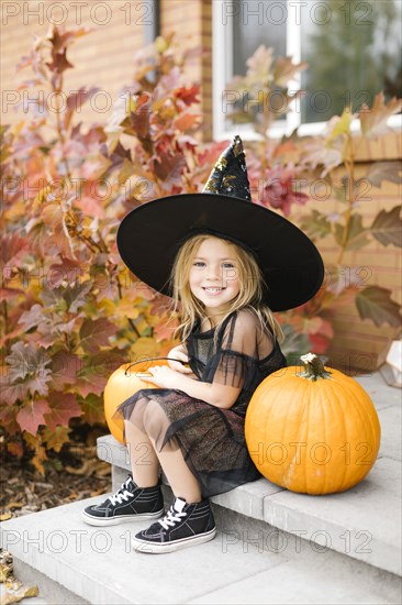 Girl in witch costume for Halloween