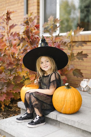 Girl in witch costume for Halloween