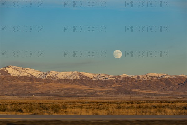 Moon over hills in Boise, Idaho