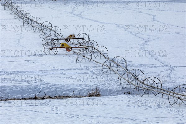 Irrigation system on farm during winter