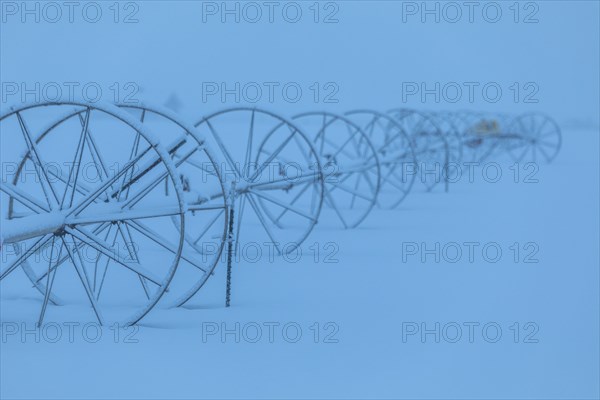 Irrigation system on farm during winter