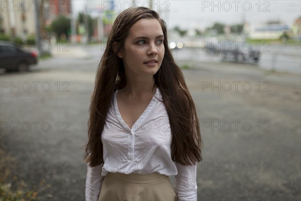 young woman in parking lot