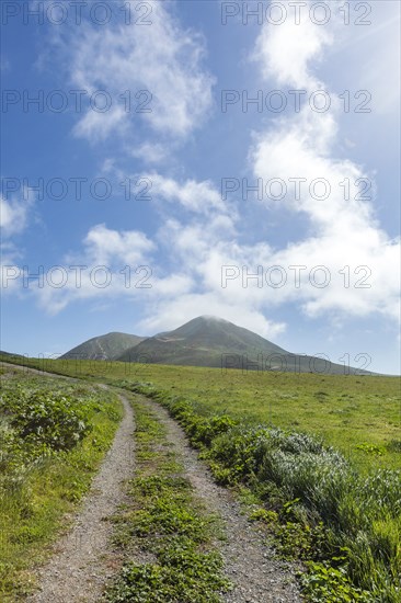 USA, California, San Luis Obispo, Dirt road under clouds