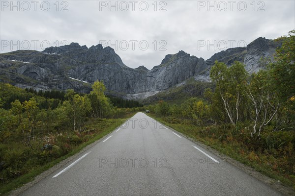 Norway, Lofoten Islands, Empty road in mountain landscape