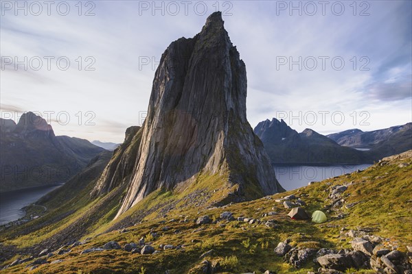 Norway, Senja, Two tents near Segla mountain at sunset