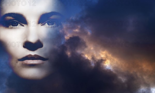 Double exposure of woman and overcast sky