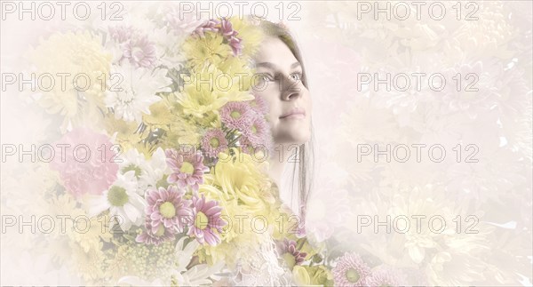 Double exposure of woman and flowers