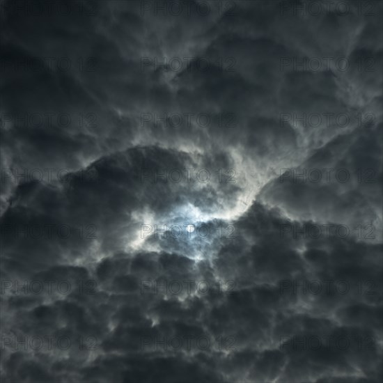 Full moon in dramatic night sky