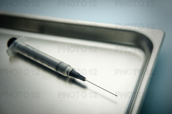 Needle on tray