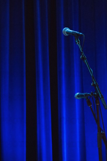 Microphone in front of stage curtain