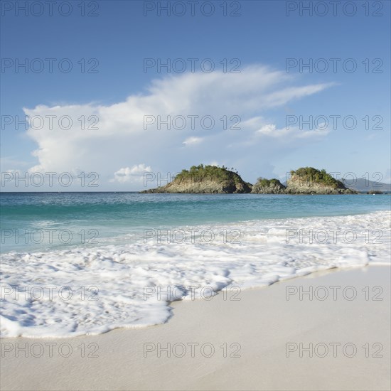 Beach with cliff in distance at Trunk Bay in St. John, Virgin Islands