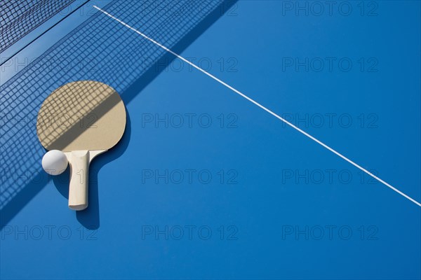 Table tennis paddle and ball