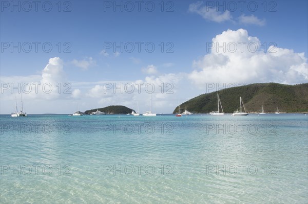 Boats in sea at Maho Bay in St. John, Virgin Islands