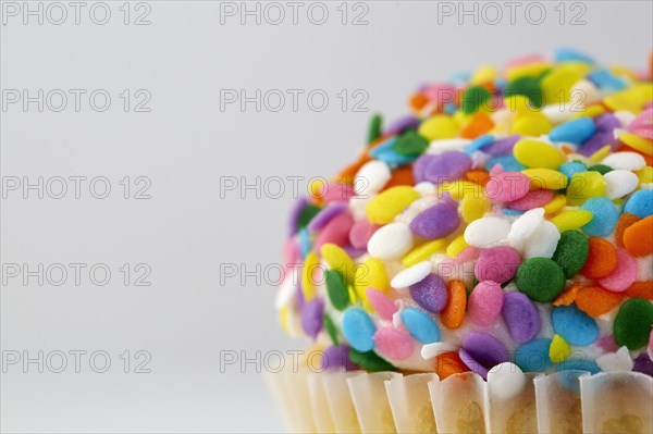 Cupcake with colorful sprinkles