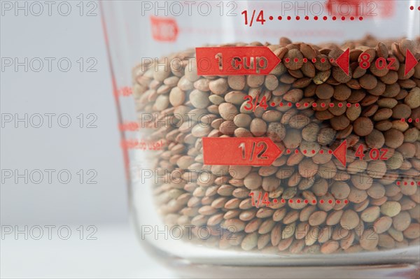 Lentils in measuring cup