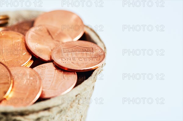 Pennies in cup