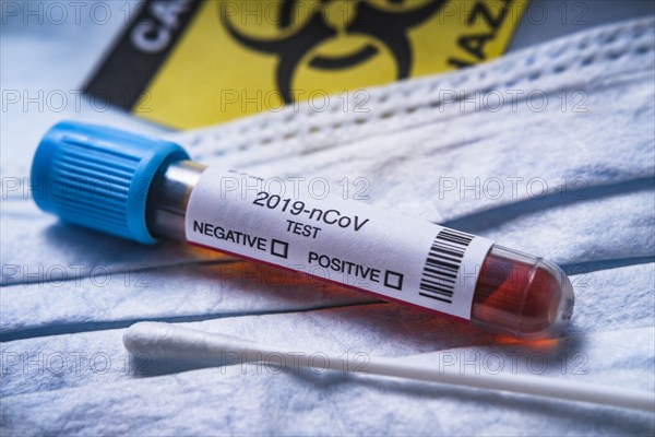 2019-nCoV coronavirus test vial with biohazard symbol