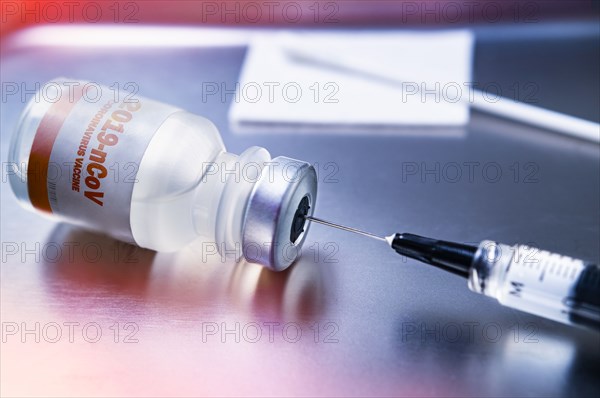 Hypodermic needle and vial of vaccine for Coronavirus